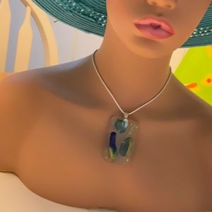 Clear with gorgeous blue green glass tints 2+”